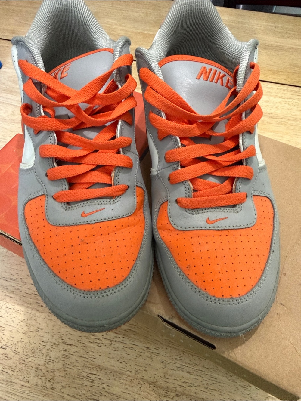 Nike Men’s Orange and Gray Lace-Up Sneakers. Air Vomero.